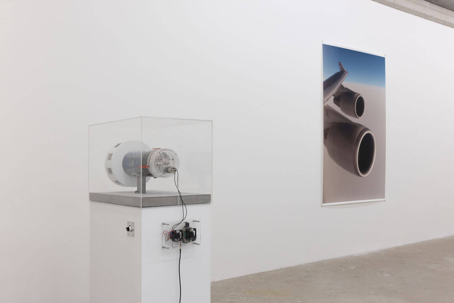 lPolitical Atmosphere next to a print from Wolfgang Tillmnans